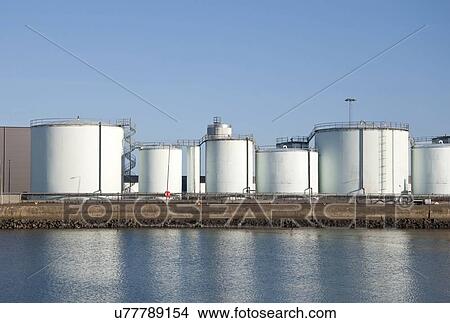Storage tanks at oil refinery. View Large Photo Image Picture - Storage tanks at oil refinery.. Fotosearch