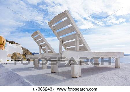 Sun loungers, Oia, Santorini, Greece. View Large Photo Image Stock Photo - Sun loungers, Oia, Santorini, Greece.. Fotosearch