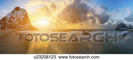 Stock Image - Sunrise over Arctic Sea.. Fotosearch