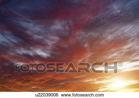 Sunrise with clouds. View Large Photo Image Stock Photograph - Sunrise with clouds.. Fotosearch