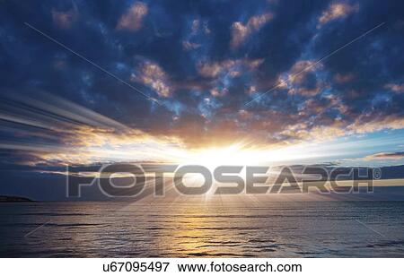 Stock Photo - Sunset over sea.. Fotosearch