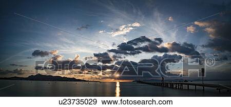 Stock Photo - Sunset over the sea, Mallorca, Spain.. Fotosearch