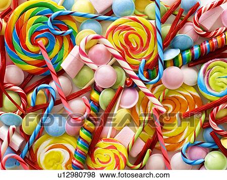 Stock Photo - Sweets and candy canes, full frame.. Fotosearch