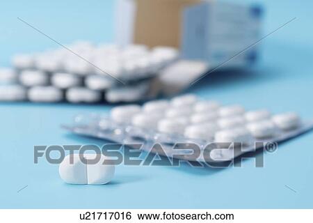 Stock Photograph - Tablets and blister packs.. Fotosearch
