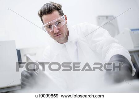Technician storing stem cell samples in cryostorage. They have been frozen in liquid nitrogen to preserve them. Stem cells are a potential source of cells to repair damaged tissue in diseases such as Parkinson's and insulin-dependent diabetes. View Large Photo Image Stock Photo - Technician storing stem cell samples in cryostorage. They have been frozen in liquid nitrogen to preserve them. Stem cells are a potential source of cells to repair damaged tissue in diseases such as Parkinson's and insulin-dependent diabetes.. Fotosearch