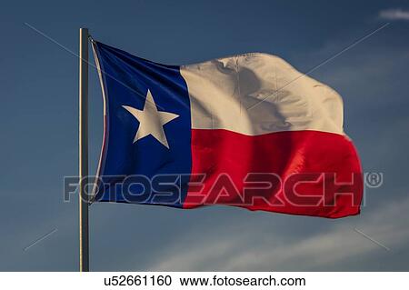 Texas "Lone Star" State Flag in blue sky View Large Photo Image Stock Image - Texas "Lone Star" State Flag in blue sky. Fotosearch