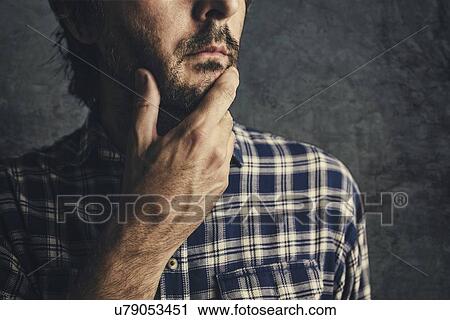 Stock Image - Thoughtful man.. Fotosearch