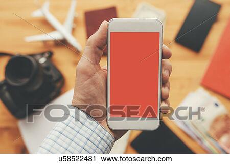 Stock Image - Travel app, conceptual image. Fotosearch