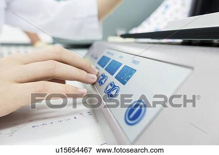 Using PCR (polymerase chain reaction) machine. View Large Photo Image Stock Photo - Using PCR (polymerase chain reaction) machine.. Fotosearch