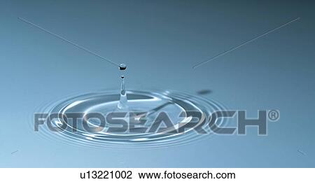 Stock Image - Water drop impact.. Fotosearch