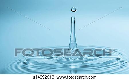 Stock Image - Water drop impact.. Fotosearch