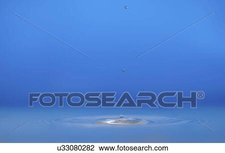 Water drop impact. View Large Photo Image Stock Image - Water drop impact.. Fotosearch