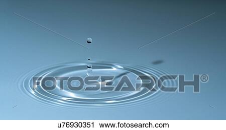 Stock Image - Water drop impact.. Fotosearch