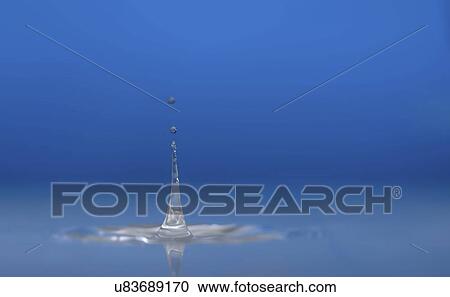Stock Image - Water drop impact.. Fotosearch
