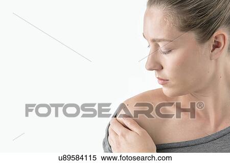 Woman checking moles on shoulder. View Large Photo Image Stock Photography - Woman checking moles on shoulder.. Fotosearch