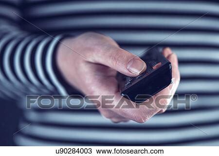 Woman using remote control. View Large Photo Image Stock Image - Woman using remote control.. Fotosearch