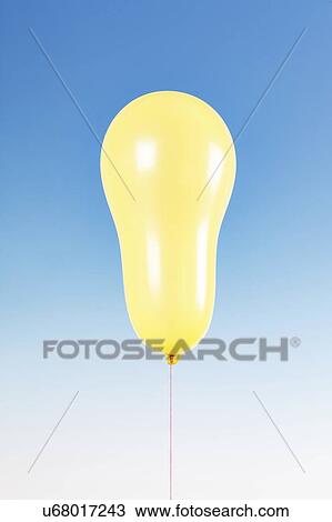 Stock Image - Yellow balloon.. Fotosearch