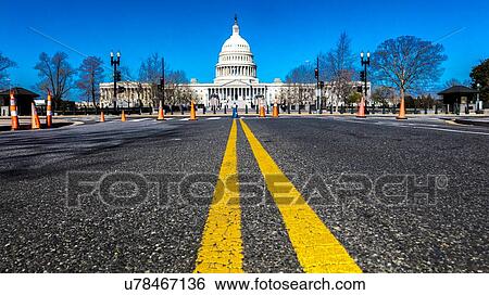 Stock Photograph - Yellow lines lead to US Capitol, Washington D. C. . Fotosearch