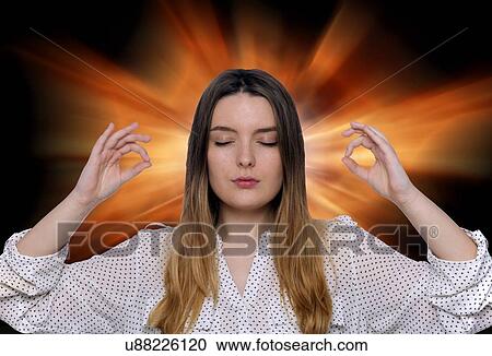 Young woman meditating. View Large Photo Image Stock Image - Young woman meditating.. Fotosearch