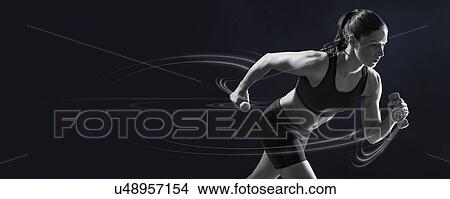 Picture - Young woman running with hand weights.. Fotosearch