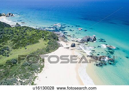 Stock Photo - Australia, NSW, Bermagui, Aerial view of scenic beach. Fotosearch
