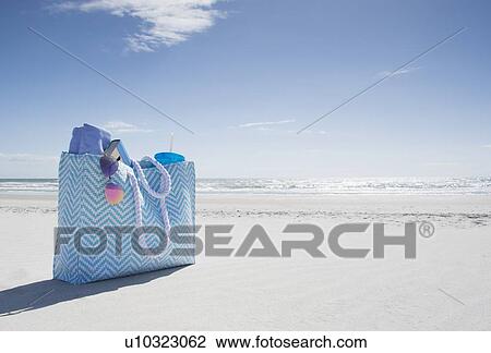 Stock Image - Bag with beach equipment. Fotosearch
