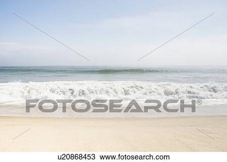 Stock Image - Beach at sunny day. Fotosearch