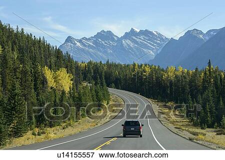 Canada, Alberta, Banff, AB-93 road in mountain landscape View Large Photo Image Stock Photo - Canada, Alberta, Banff, AB-93 road in mountain landscape. Fotosearch