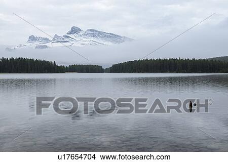 Picture - Canada, Alberta, Banff, Mountain peak over Two Jack Lake. Fotosearch
