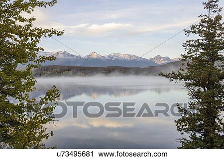 Canada, Alberta, Jasper, Mountain landscape and Patricia Lake in Jasper National Park View Large Photo Image Stock Image - Canada, Alberta, Jasper, Mountain landscape and Patricia Lake in Jasper National Park. Fotosearch