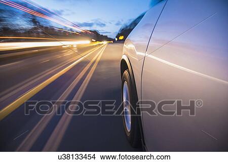 Car on highway View Large Photo Image Picture - Car on highway. Fotosearch