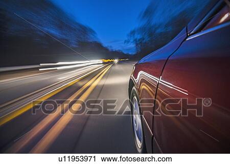 Stock Image - Car on highway. Fotosearch