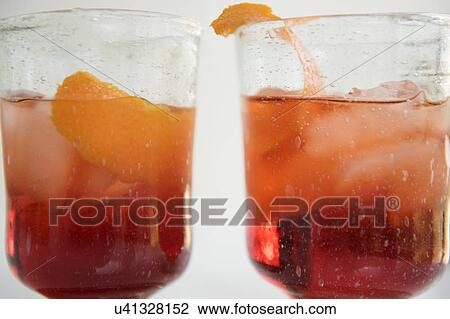 Close up of drinks in glasses View Large Photo Image Stock Image - Close up of drinks in glasses. Fotosearch