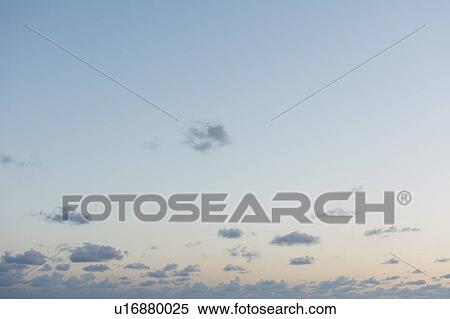 Clouds in sky at dawn View Large Photo Image Stock Photography - Clouds in sky at dawn. Fotosearch
