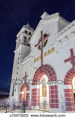 Stock Image - El Salvador, Sonsonate, Juayua, Black Christ of Juayua Church at night. Fotosearch