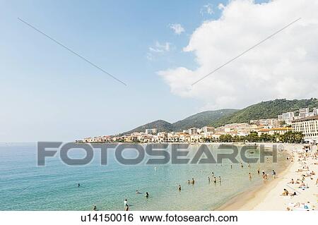 France, Corsica, Ajaccio, People on beach View Large Photo Image Stock Photograph - France, Corsica, Ajaccio, People on beach. Fotosearch