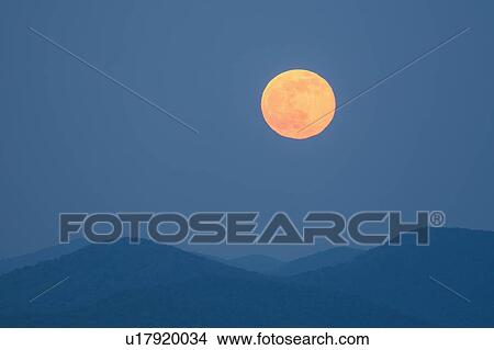 Picture - Full moon over Blue Ridge Mountains. Fotosearch
