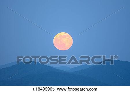 Stock Photography - Full moon over Blue Ridge Mountains. Fotosearch