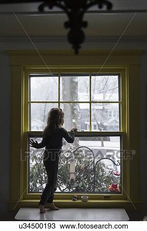 Girl by window View Large Photo Image Stock Image - Girl by window. Fotosearch