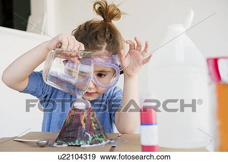 Stock Photo - Girl making volcano. Fotosearch