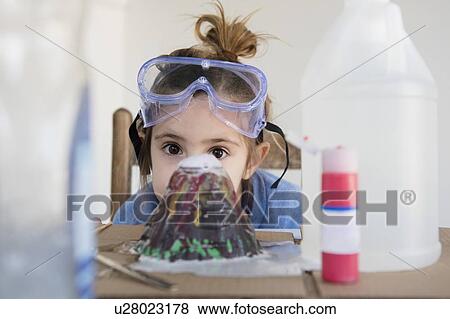 Stock Photo - Girl making volcano. Fotosearch