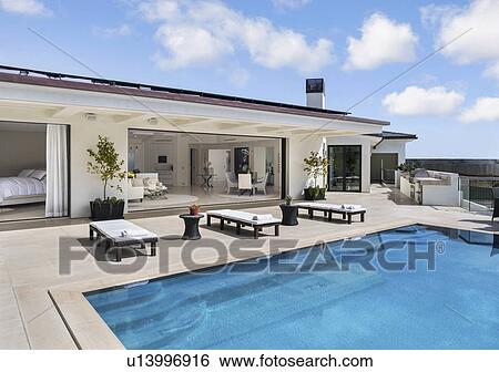 House with swimming pool View Large Photo Image Stock Photograph - House with swimming pool. Fotosearch