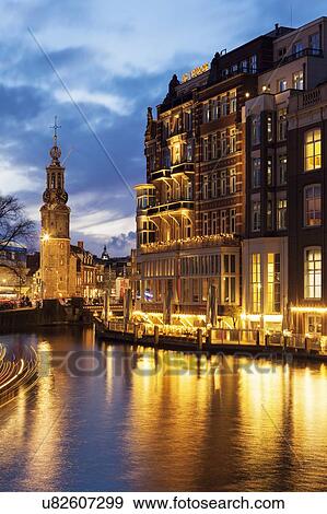 Netherlands, Amsterdam, Building upon canal at night View Large Photo Image Stock Photo - Netherlands, Amsterdam, Building upon canal at night. Fotosearch