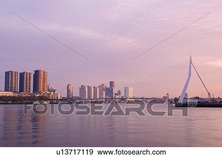 Stock Photo - Netherlands, Rotterdam, Cable-stayed bridge over river. Fotosearch