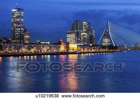 Stock Photo - Netherlands, Rotterdam, Cityscape at night. Fotosearch