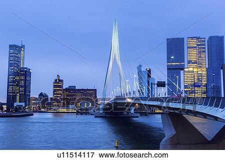 Stock Photo - Netherlands, Rotterdam, Cityscape at dusk. Fotosearch