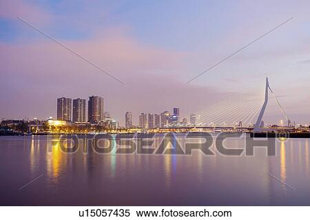 Stock Photography - Netherlands, Rotterdam, Cityscape at sunrise. Fotosearch