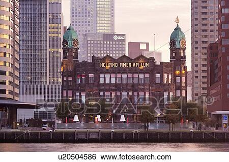 Stock Photograph - Netherlands, Rotterdam, Old building on waterfront. Fotosearch