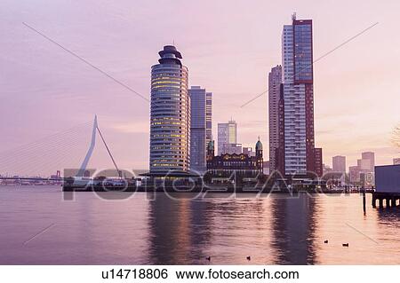 Stock Photograph - Netherlands, Rotterdam, Old building between skyscrapers. Fotosearch