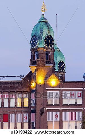 Stock Image - Netherlands, Rotterdam, Tower with weather vane. Fotosearch